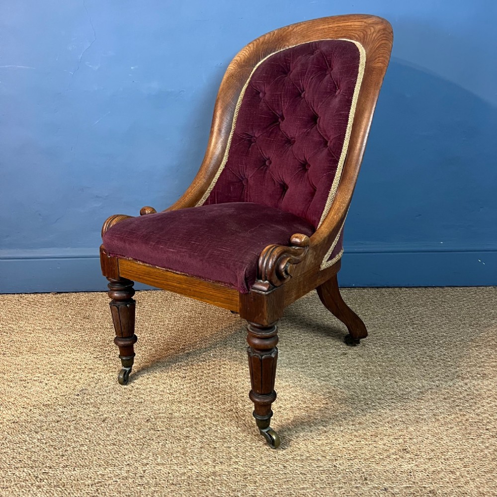 A William IV oak spoon back chair circa 1835