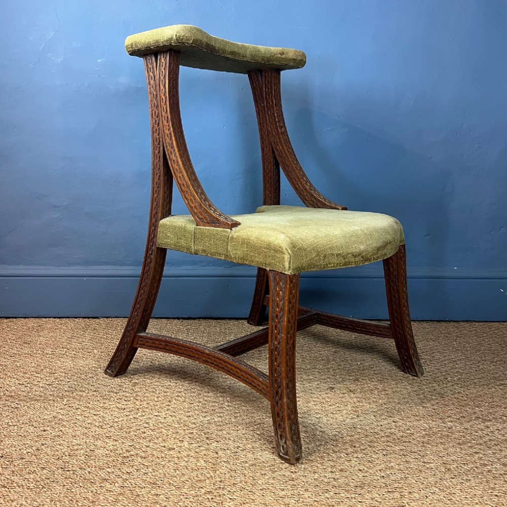 An early Victorian mahogany library chair circa 1850 in the manner of JG Crace