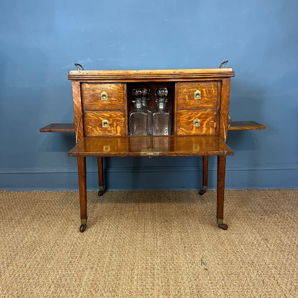 A rare Edwardian oak drinks cabinet circa 1910