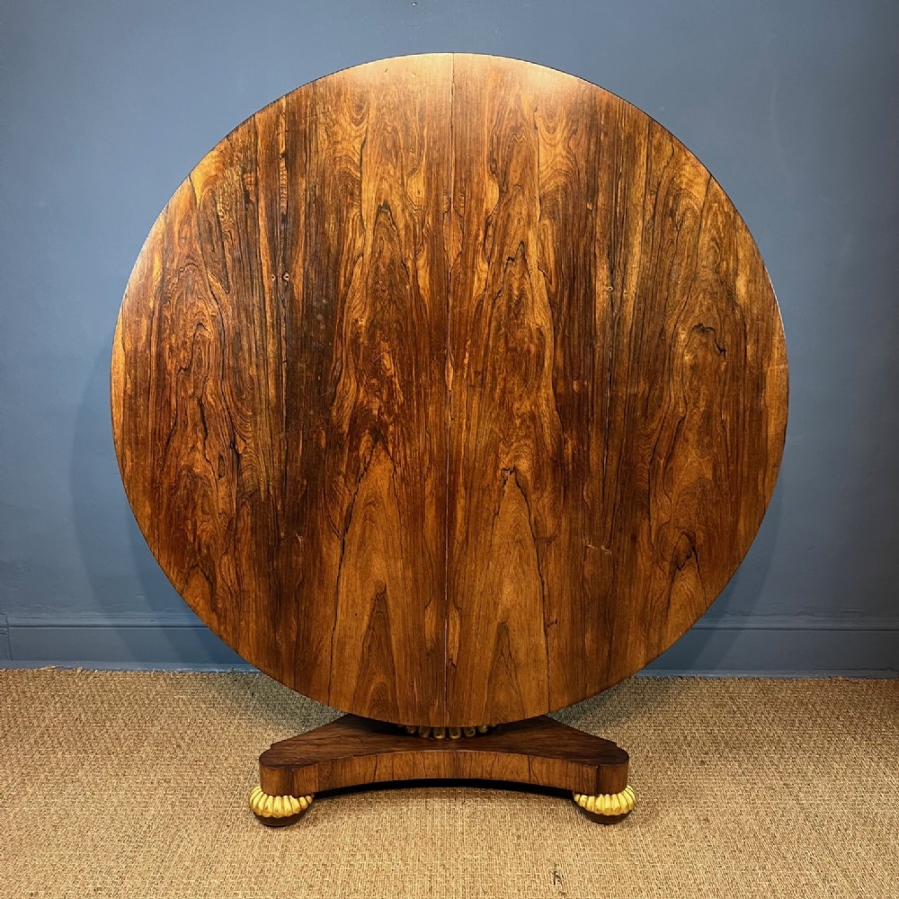 A Regency rosewood and parcel gilt centre table circa 1820 by Wilkinsons of Ludgate Hill