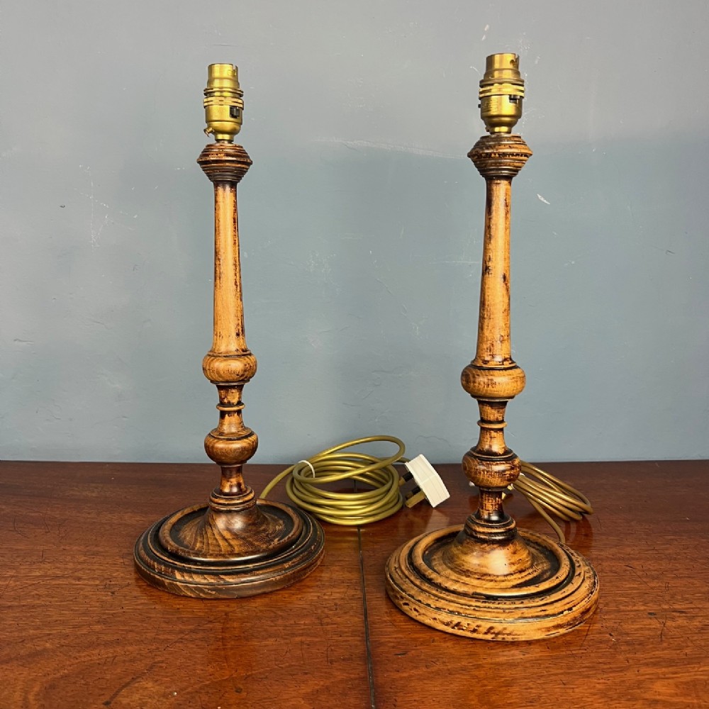 A pair of late 19th century turned wooden table lights circa 1900 rewired and tested