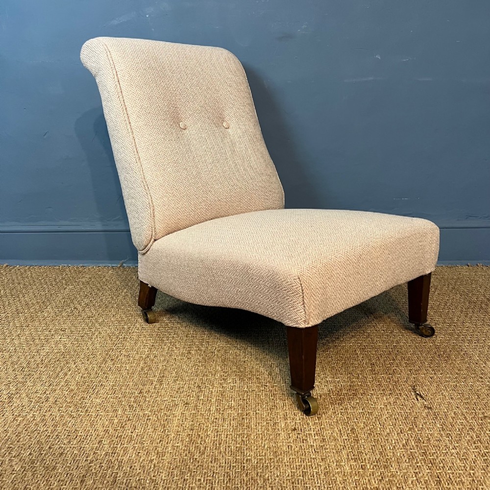 An Edwardian mahogany Howard design nursing chair circa 1910