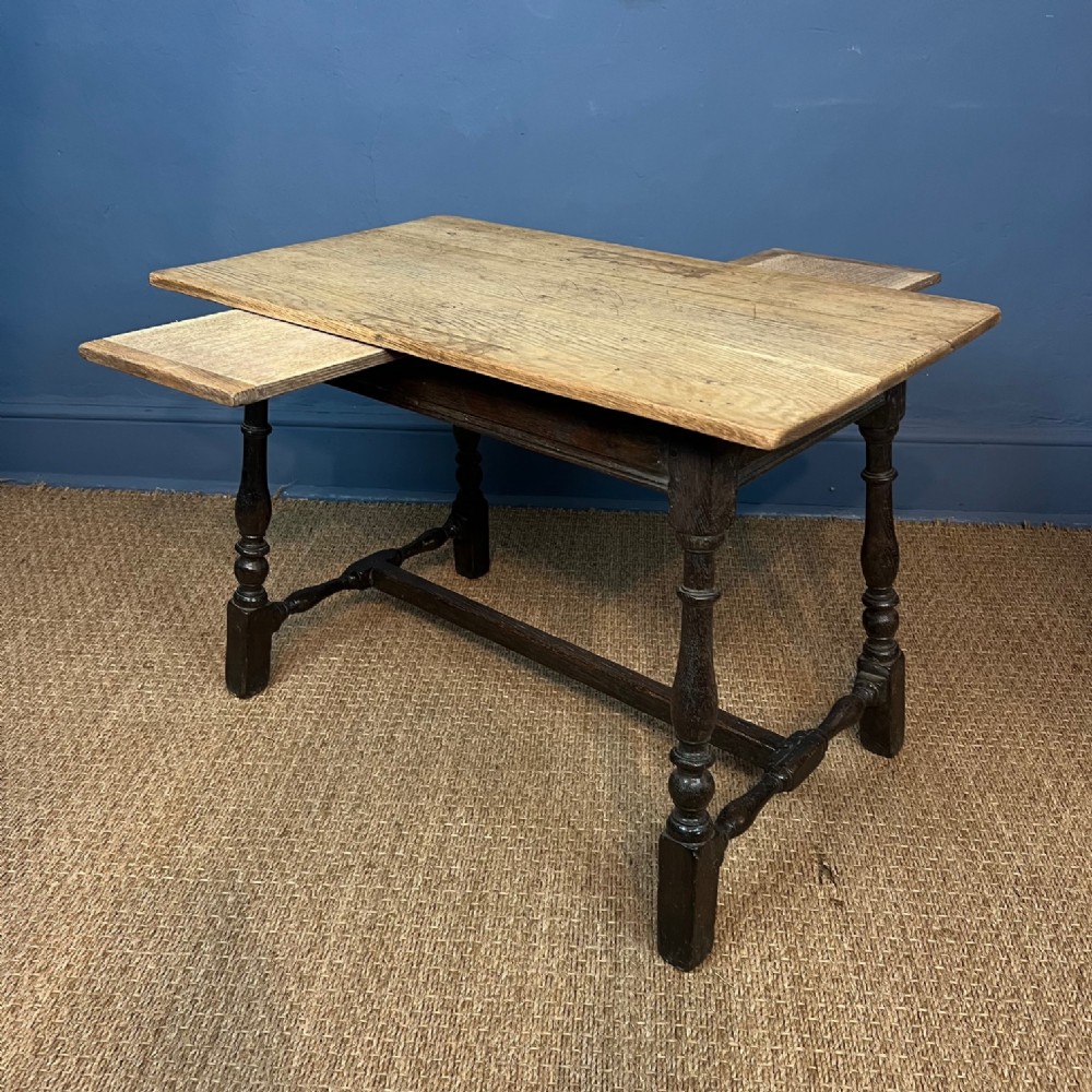 An Arts and Crafts oak coffee table circa 1900 