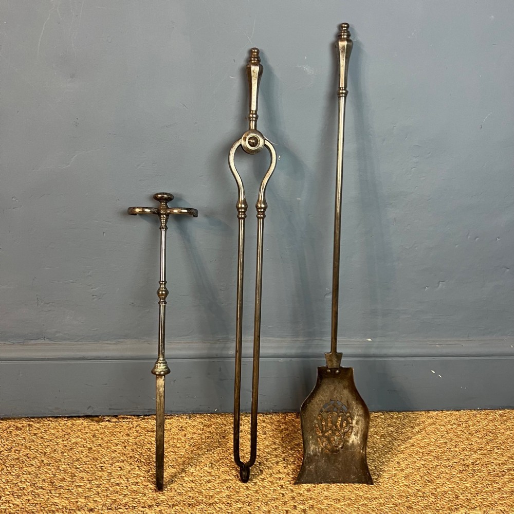 A set of 3 Georgian steel fire irons circa 1820