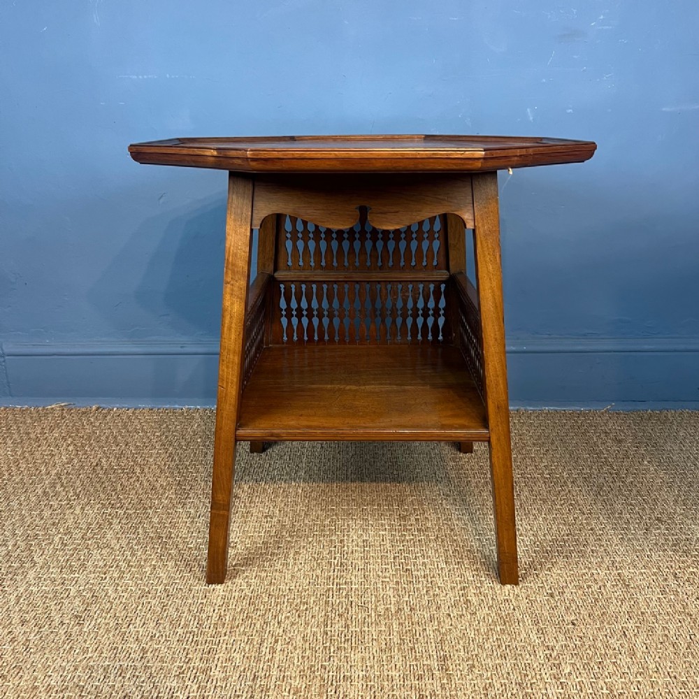 An Arts and Crafts walnut octagonal table attributed to Morris and Co circa 1890