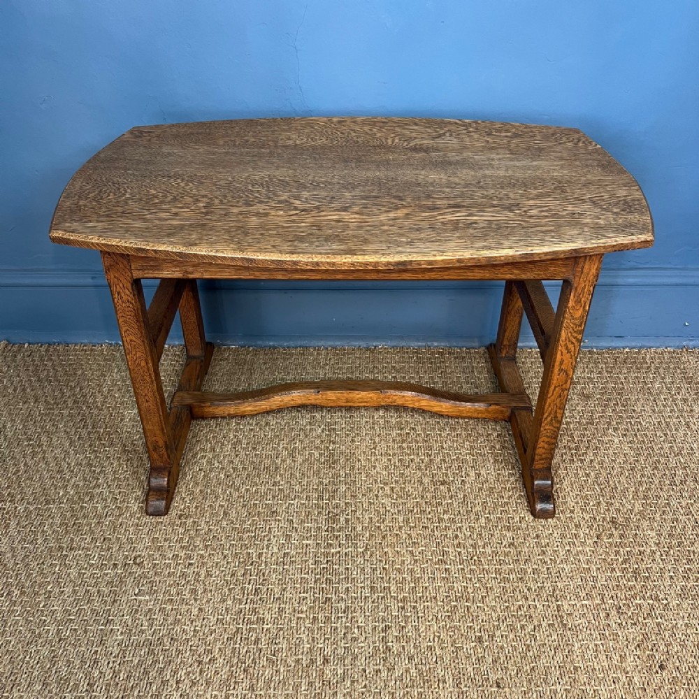  A Cotswold School oak coffee table circa 1930