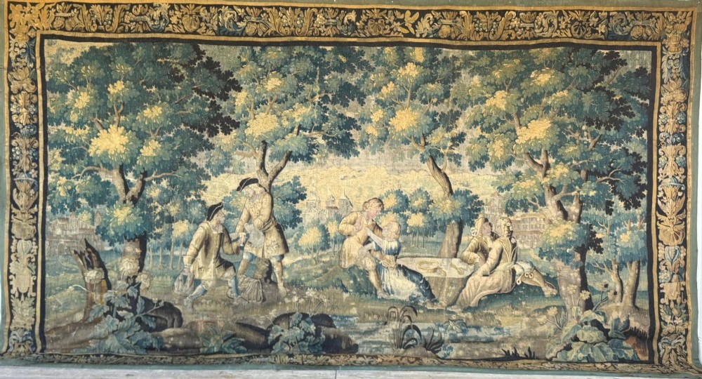 An enormous late 17th c Louis IV Aubusson Verdure Tapestry circa 1690 in excellent original condition uncut and in its original borders.