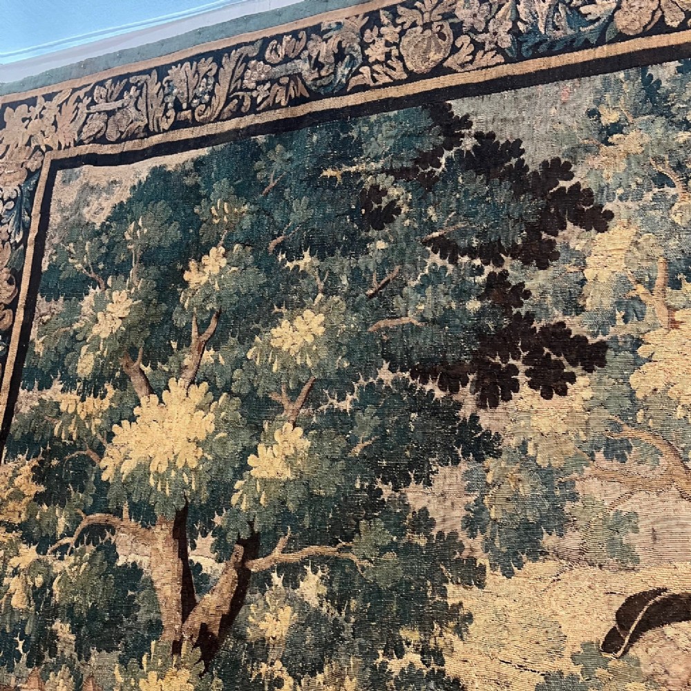 An enormous late 17th c Louis IV Aubusson Verdure Tapestry circa 1690 in excellent original condition uncut and in its original borders. View V