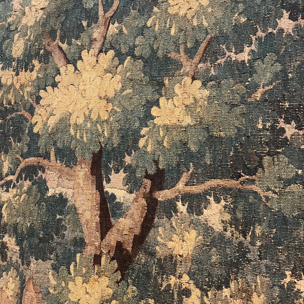 An enormous late 17th c Louis IV Aubusson Verdure Tapestry circa 1690 in excellent original condition uncut and in its original borders. View VII
