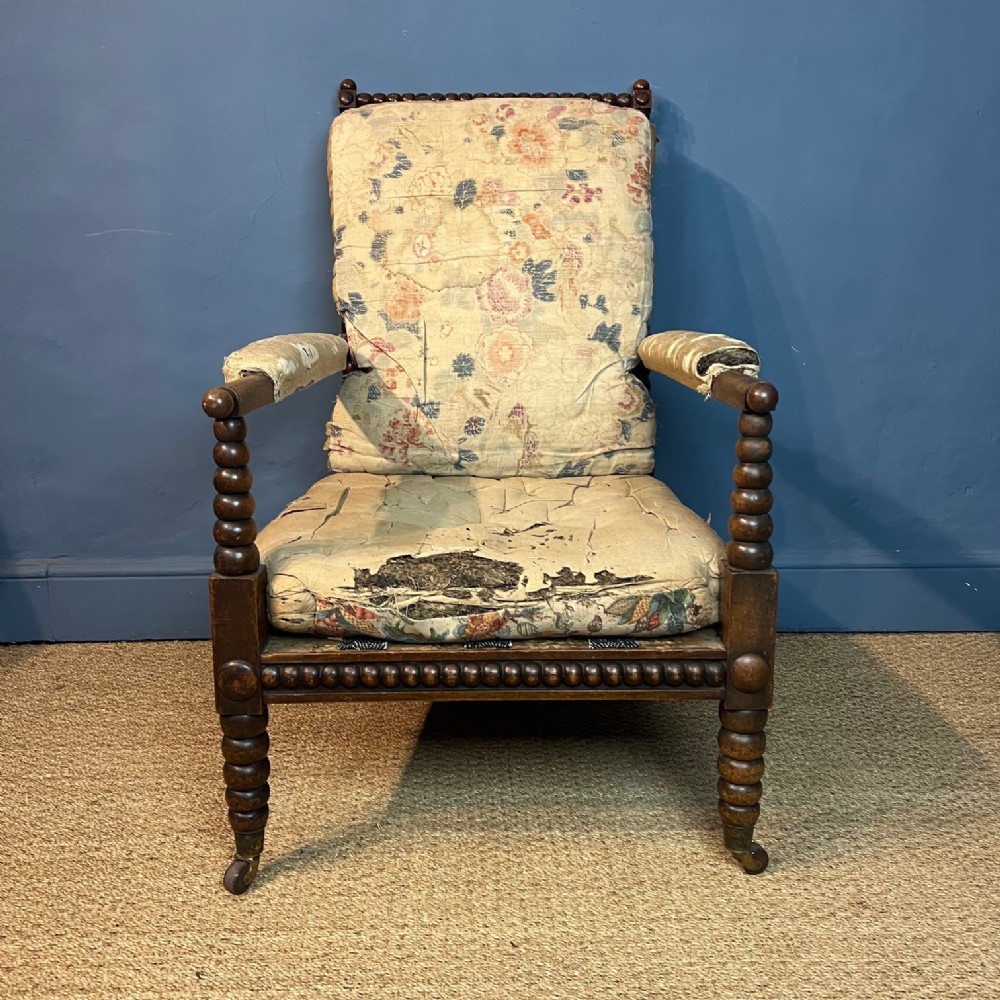 A large William IV oak bobbin chair circa 1835