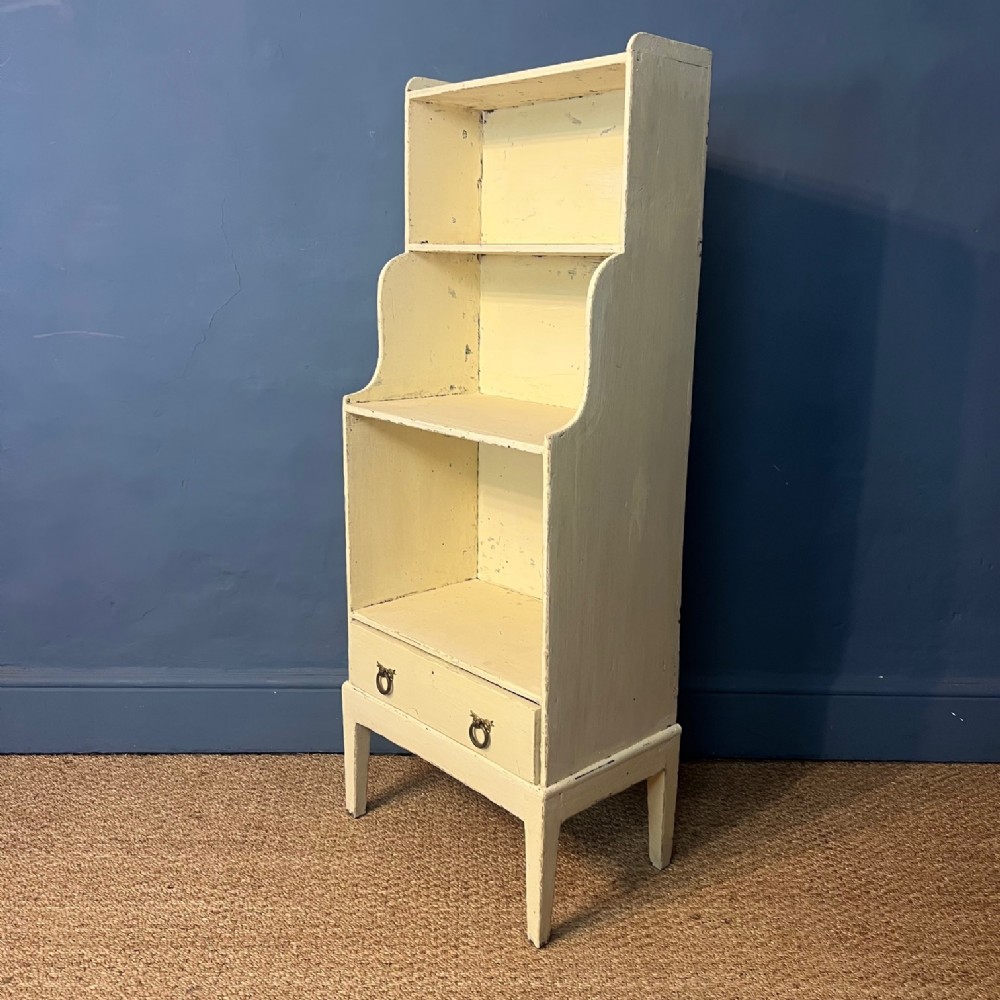 A late Regency pine waterfall bookcase circa 1830