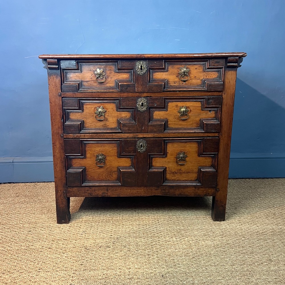 A small Charles 11 applewood and oak chest of drawers circa 1680