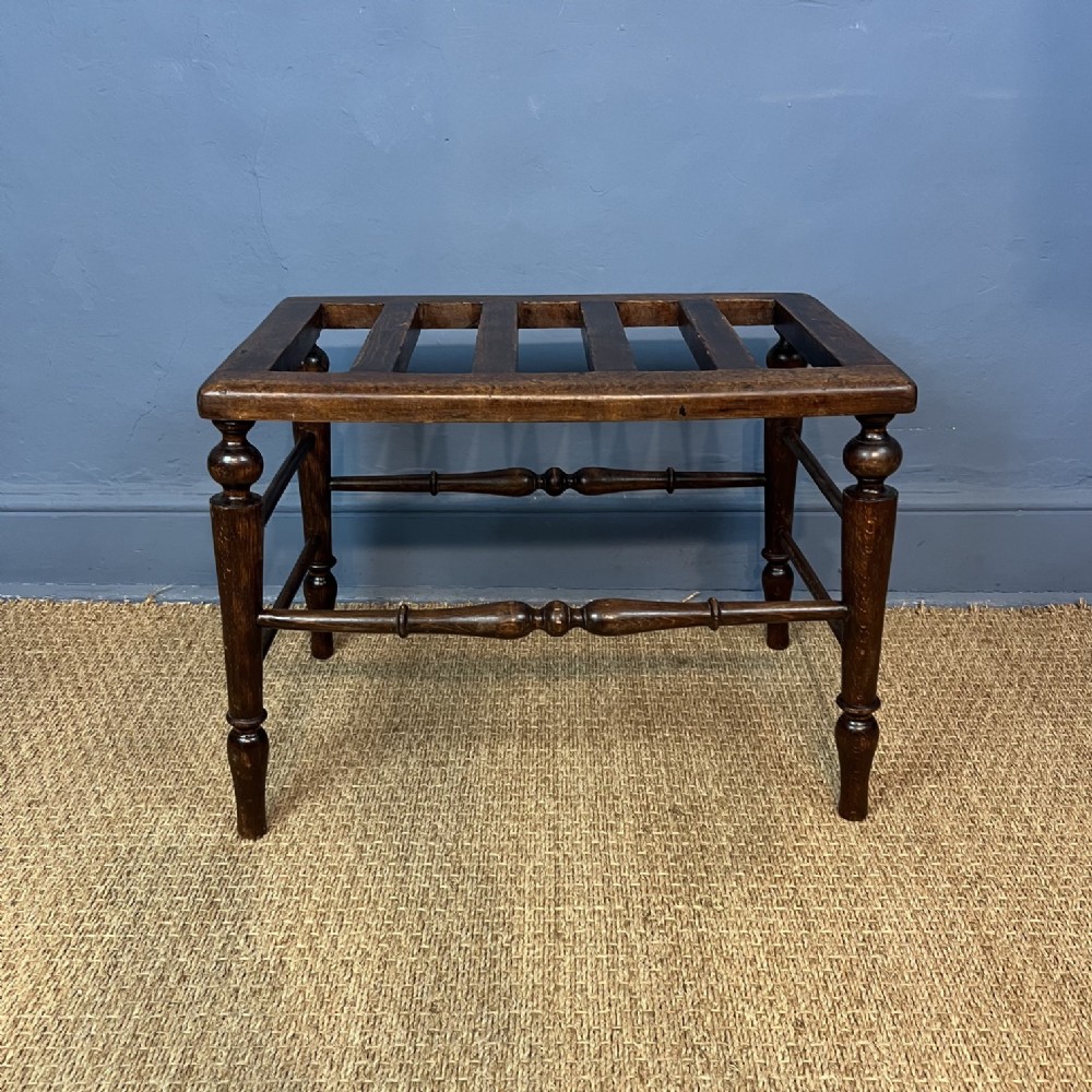 An Aesthetic Movement birch wood luggage rack circa 1880.