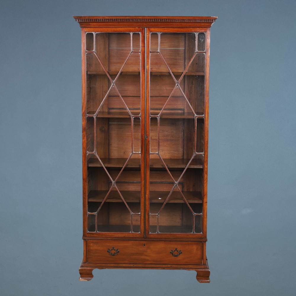 A George 111 mahogany glazed cabinet bookcase circa 1790