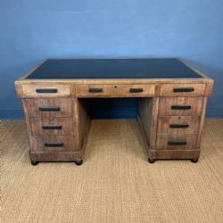 A LARGE ART DECO OAK AND EBONISED FREESTANDING LIMED OAK PEDESTAL DESK CIRCA 1930