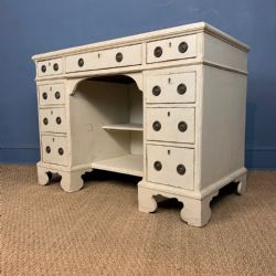 A GEORGIAN PAINTED PINE KNEEHOLE DESK CIRCA 1820