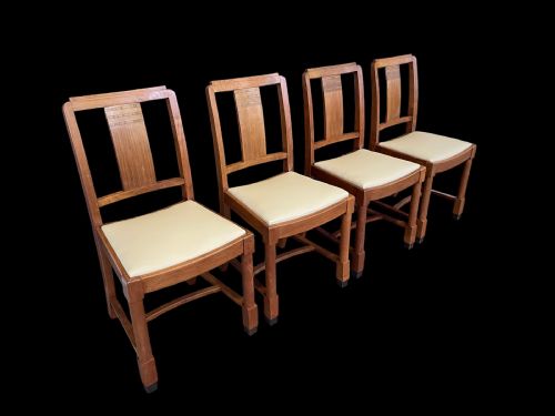 A Set of Four Art Deco Walnut Dining Room Chairs