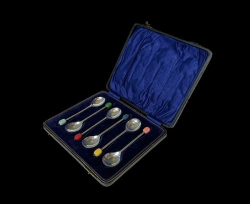 A Boxed Set of Six Harlequin Coffee Spoons