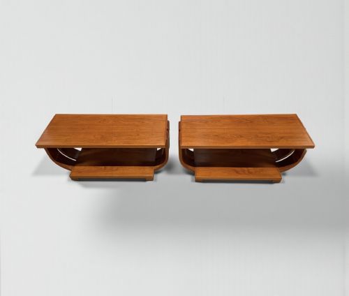 fig 1. A pair of matching warm brown Art Deco timber side tables featuring curved bentwood legs and lower shelves.