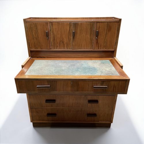 fig 1. A compact walnut bureau featuring a fitted upper cabinet with small doors, a pull-out writing surface, and four wide lower drawers with wooden bar handles.