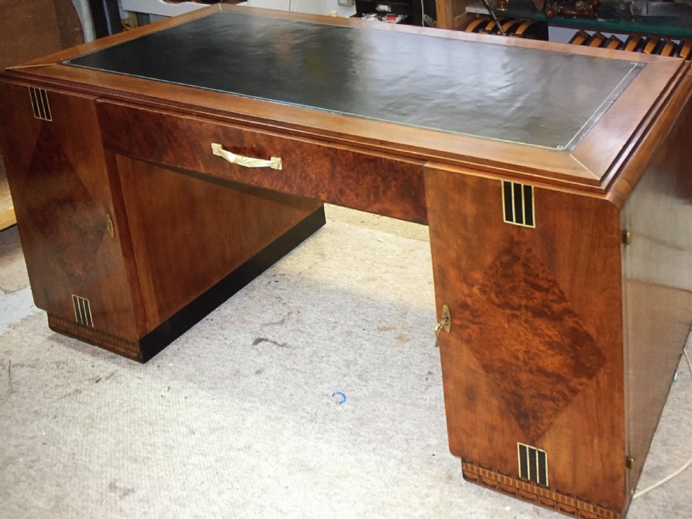 A Stunning French Art Deco Walnut Partners Desk. 