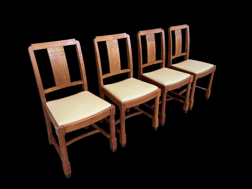 A Set of Four Art Deco Walnut Dining Room Chairs