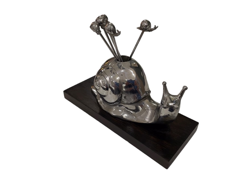 A French cocktail stick holder / escargot/snail Olive stick holder