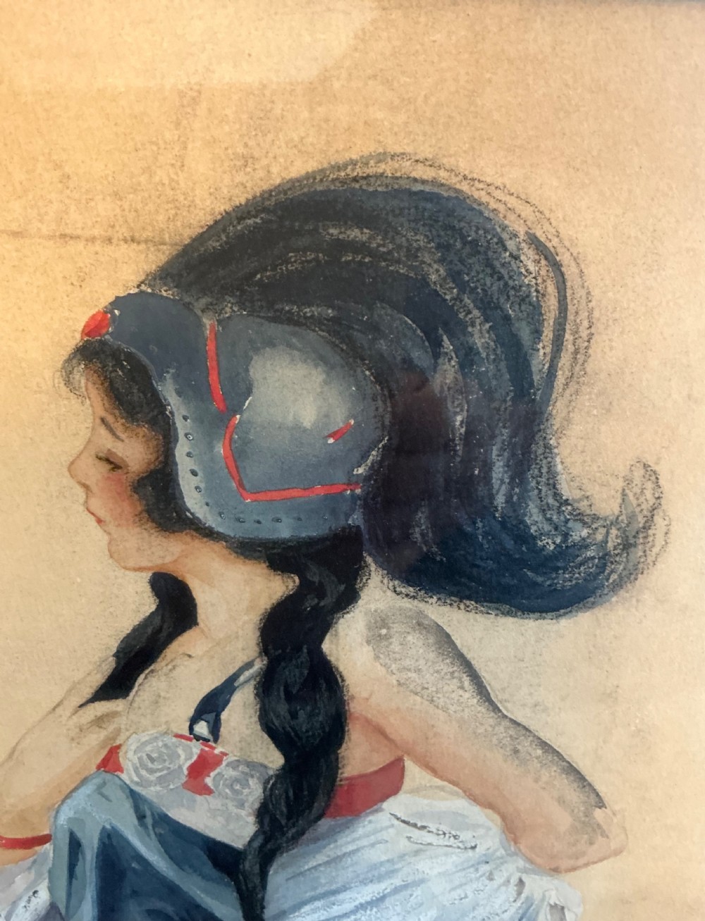 A framed pastel drawing on paper depicting a profile portrait of a young woman in 1910s attire set within a wide white mount and a slender gilt wood frame. View IV