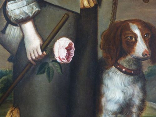 fig 2. A full-length portrait depicting a figure in 17th-century costume alongside a spaniel, encased within a moulded gold gilt frame.