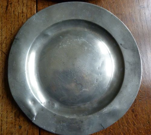 fig 1. Eight pewter plates, 1680 - 1800.