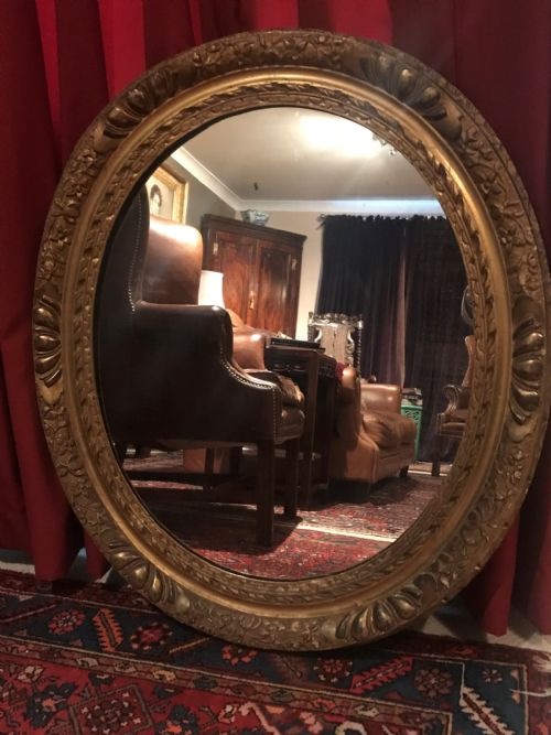 Late 17th/early 18th Century Carved Giltwood Frame, Now Holding a Mirror.