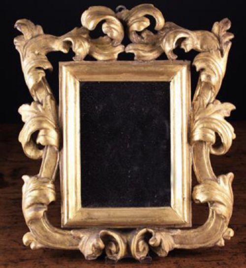 Small 17th Century Carved Giltwood Mirror.