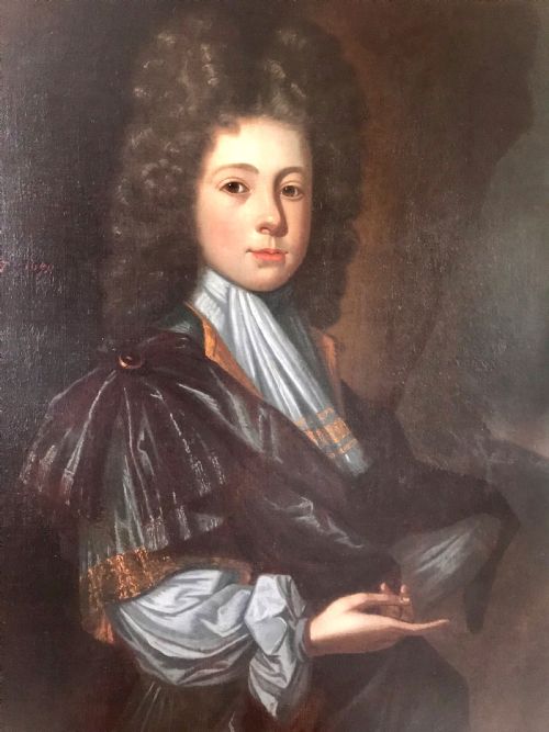 fig 1. An early 18th-century oil portrait depicting a young male with long dark curled hair, a light blue cravat, and a dark draped cloak against a dark background.