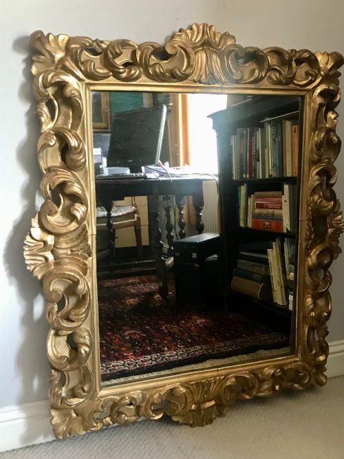Early 19th Century Florentine Carved and Giltwood Mirror.