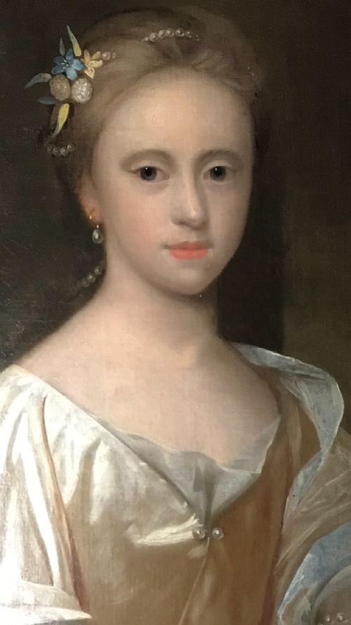fig 4. An early 18th-century oil painting depicting two young sisters in silk dresses set against a dark landscape within a gold leaf frame.