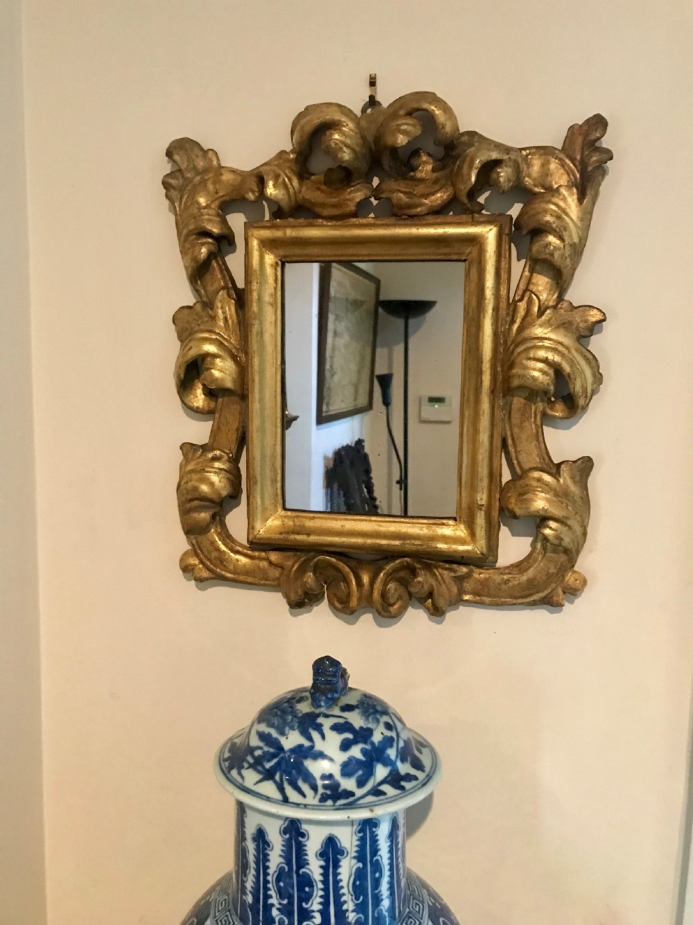 Small 17th century carved giltwood mirror. View II