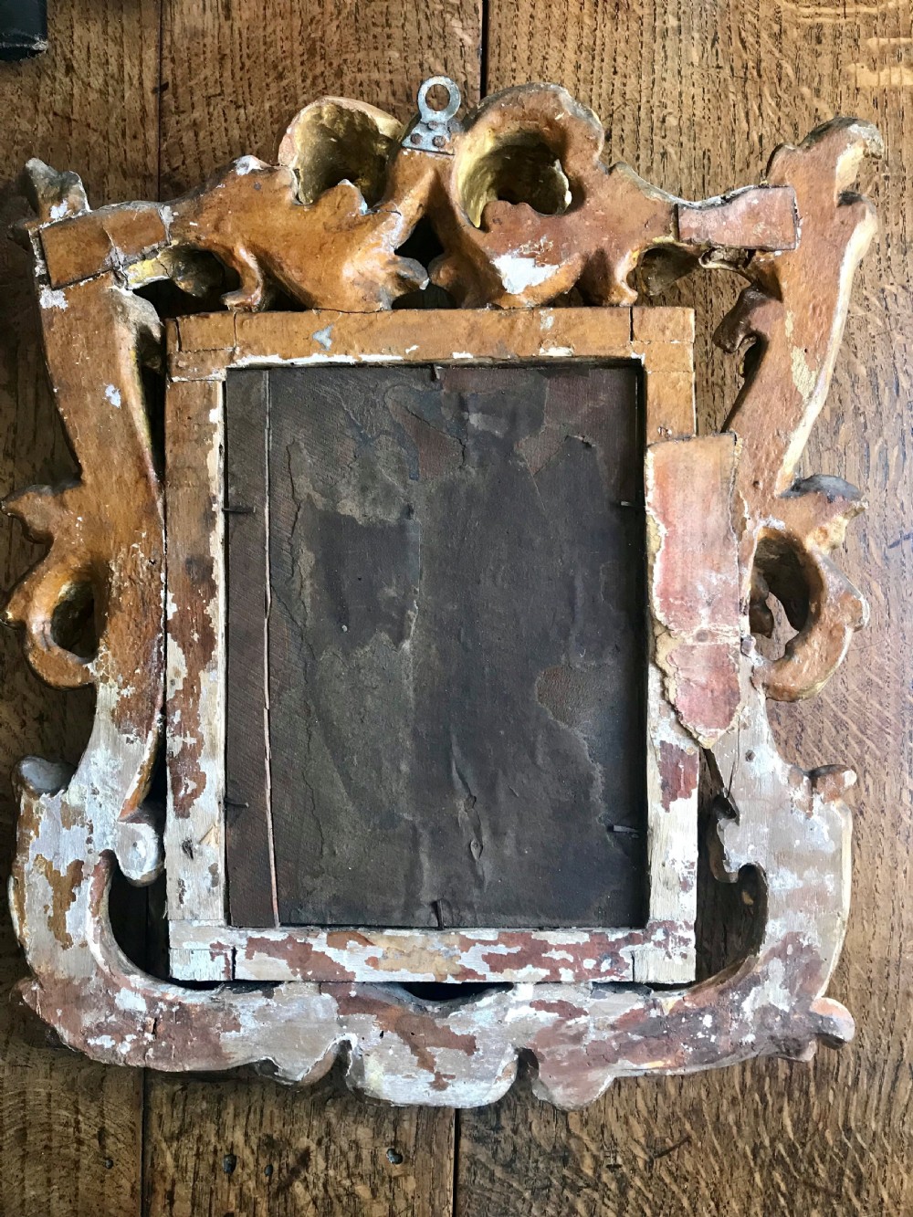 Small 17th century carved giltwood mirror. View IV