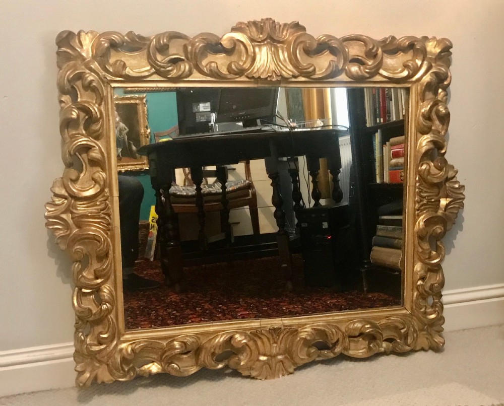 Early 19th century Florentine carved and giltwood mirror. View II