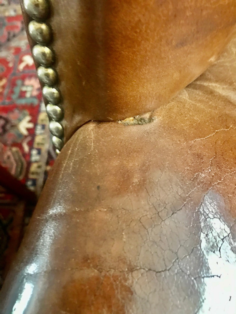 18th century style leather and mahogany wing chair, early 20th century. View V