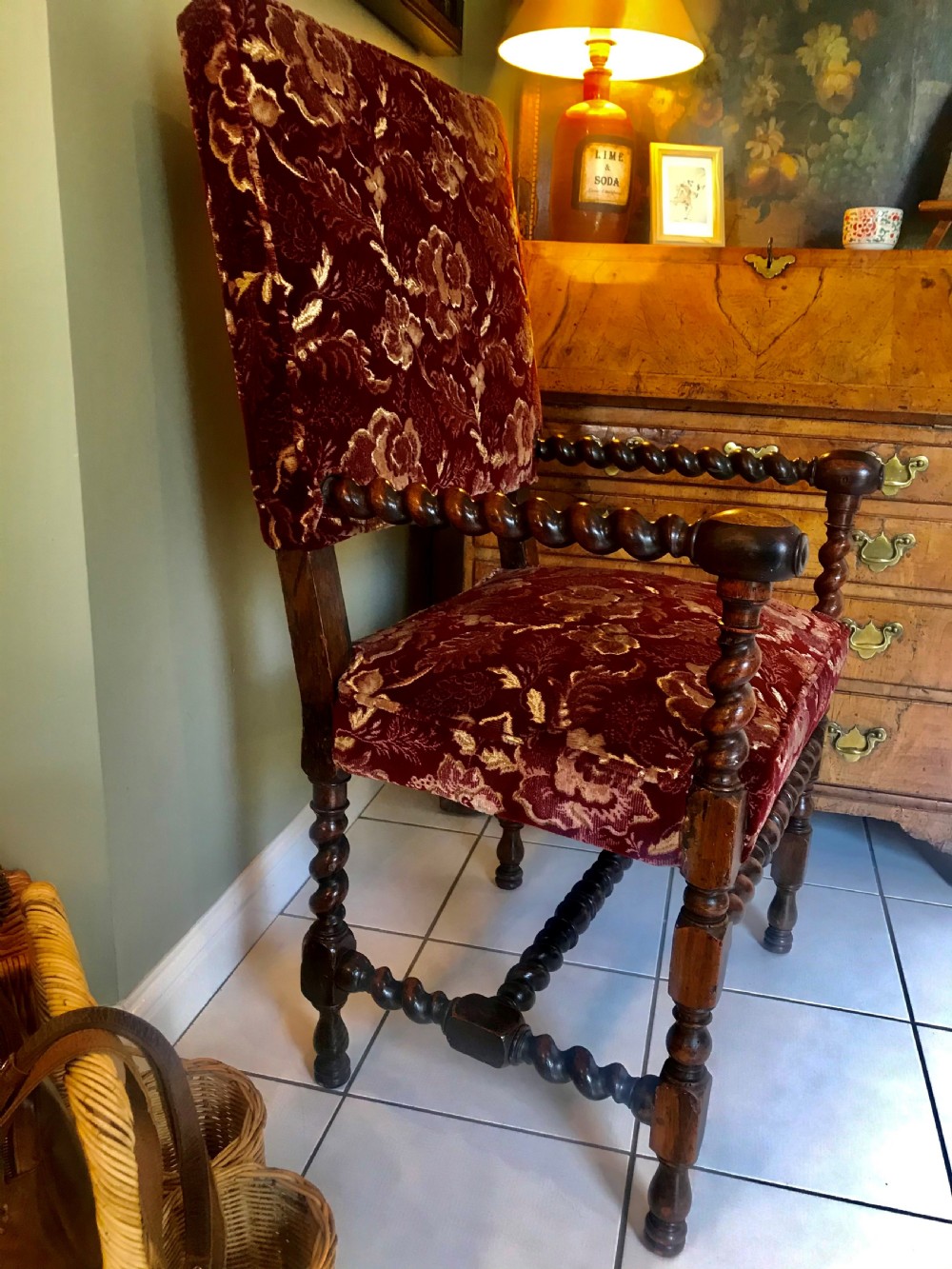 A 17th-century Carolean open armchair made from laburnum wood with spiral barley twist turnings and crimson patterned velvet upholstery. View III