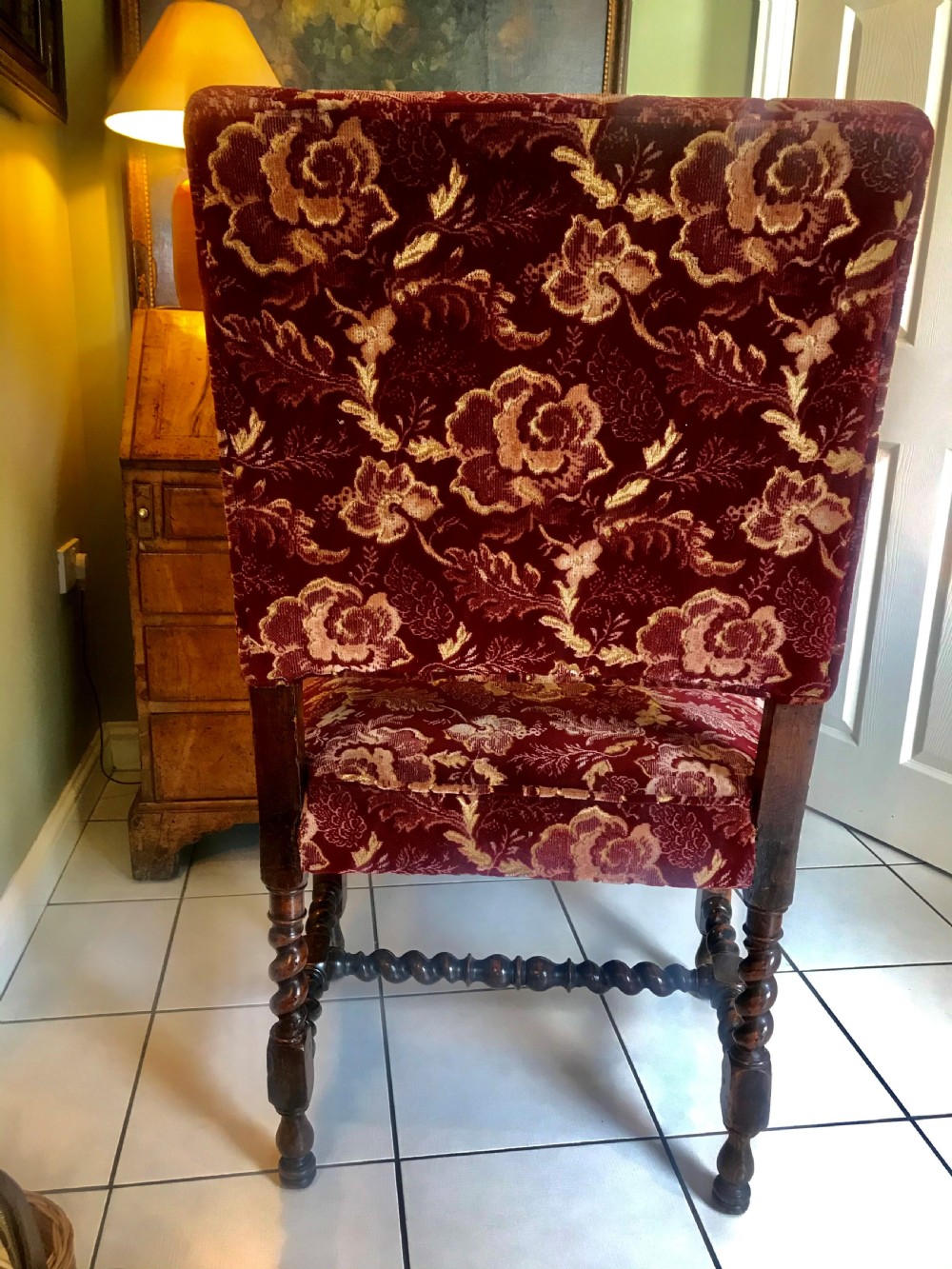 A 17th-century Carolean open armchair made from laburnum wood with spiral barley twist turnings and crimson patterned velvet upholstery. View VIII