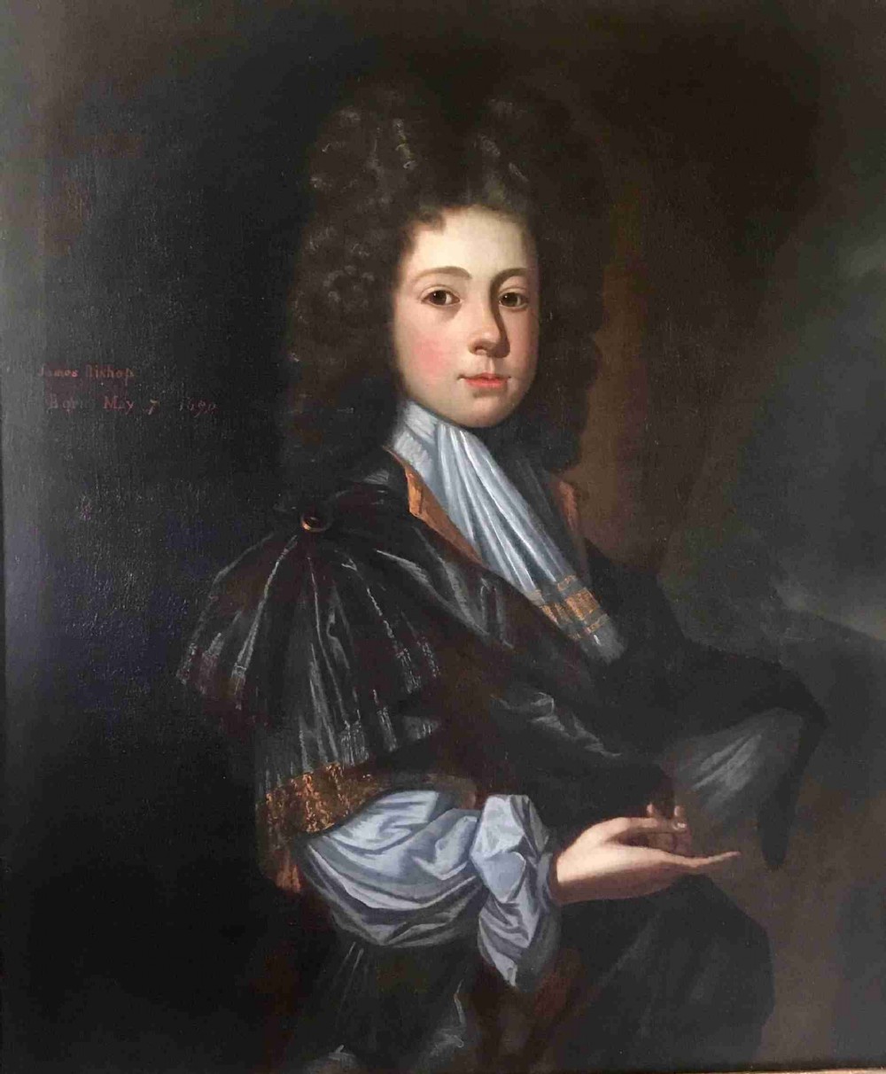 An early 18th-century oil portrait depicting a young male with long dark curled hair, a light blue cravat, and a dark draped cloak against a dark background.