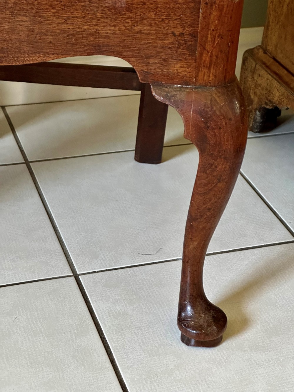A Georgian mahogany side chair featuring cabriole front legs, a Gothic pierced splat back, and a red fabric drop-in seat. View IV