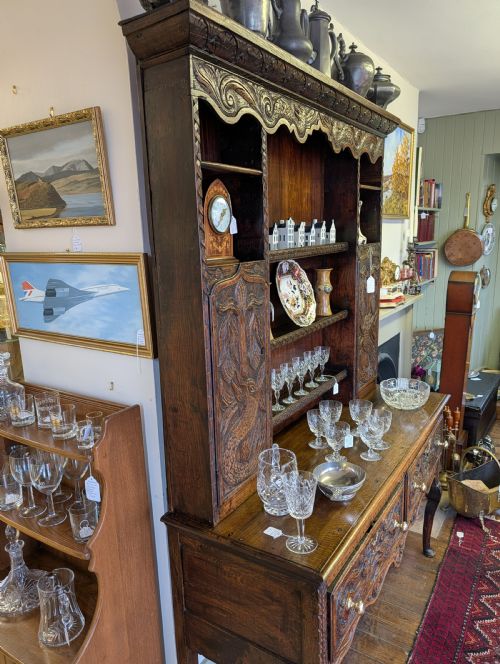 18TH CENTURY ORNATELY CARVED JACOBEAN OAK DRESSER - ADDITIONAL PHOTO 1