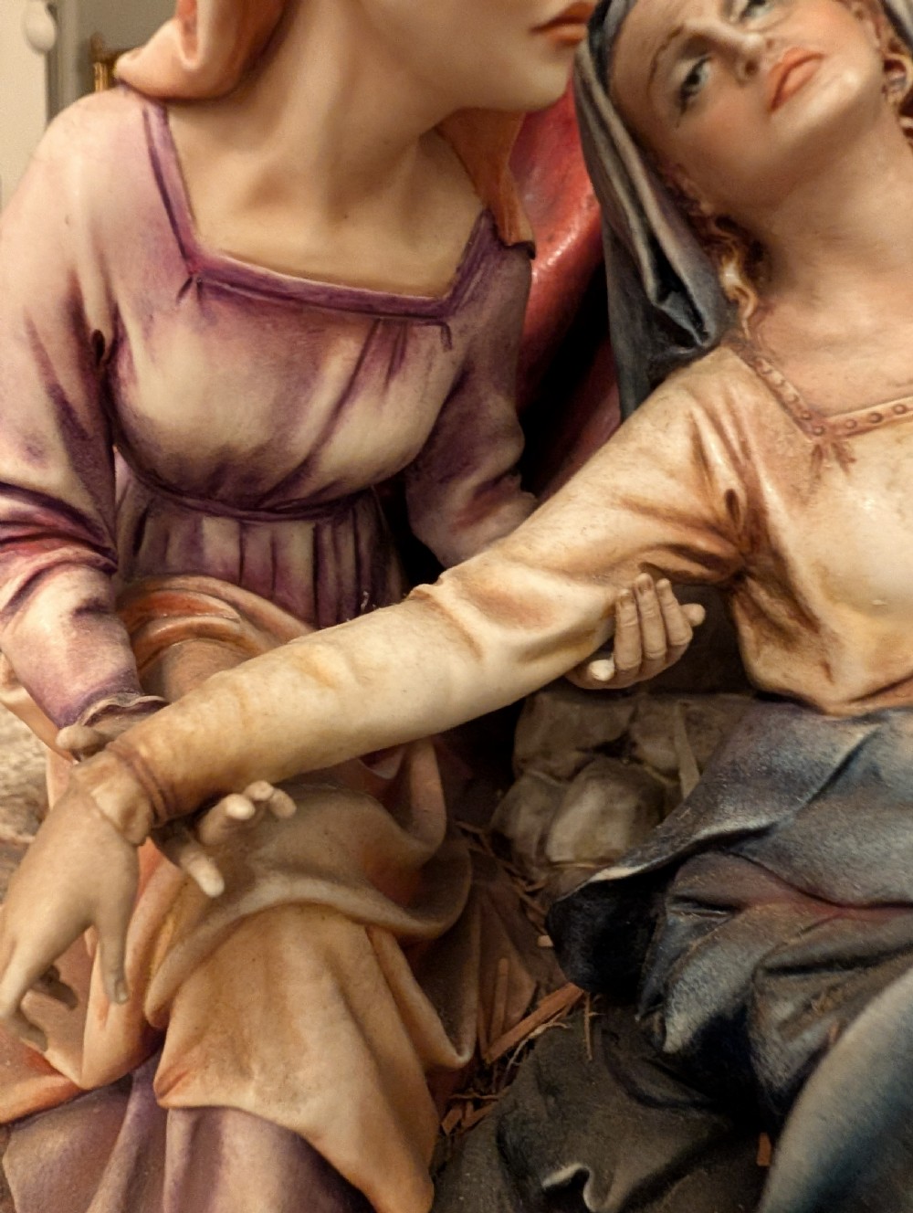 A detailed polychrome porcelain sculpture by Antonio Borsato depicting the Descent from the Cross with multiple hand-painted figures. View VII