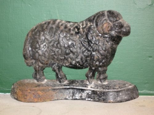 fig 1. Pair of sheep cast iron hearth ornaments