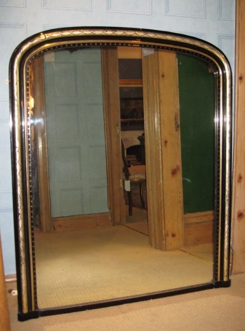 Victorian Overmantel Mirror with Ebonised and Silver Gilt Frame.