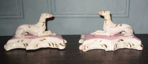 Pair of Staffordshire Seated Greyhounds