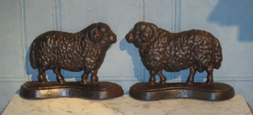 PAIR OF CAST IRON SHEEP - ADDITIONAL PHOTO 1