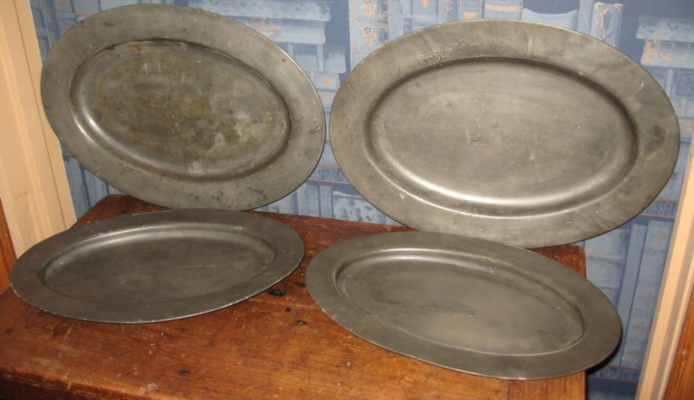 Set of four Victorian oval pewter platters